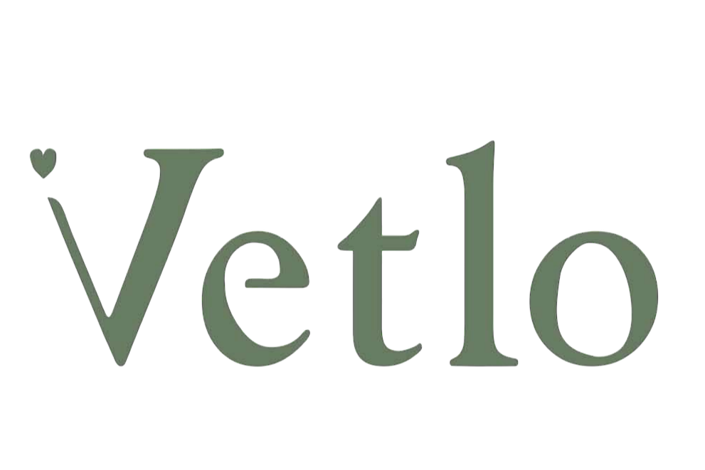 Grønn tekst med navnet Vetlo. Hjerte over V